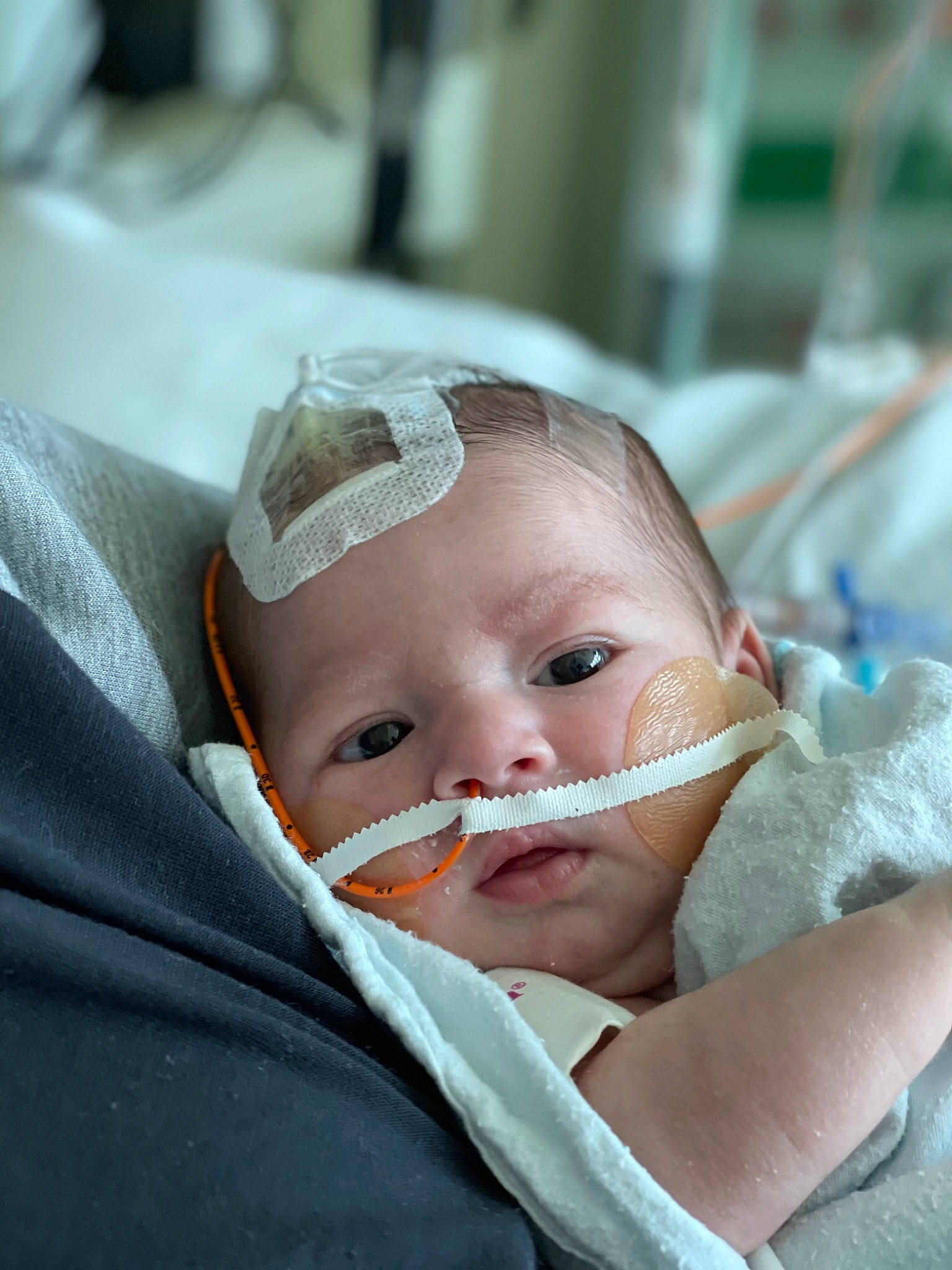 Ayda Jane is registered to the contest to win money with this photo: baby, baby_products, baby_toddler_clothing, cheek, child, comfort, ear, eyebrow, eyelash, fashion_accessory, hat, helmet, iris, linens, person, personal_protective_equipment, service, sitting, skin, toddler