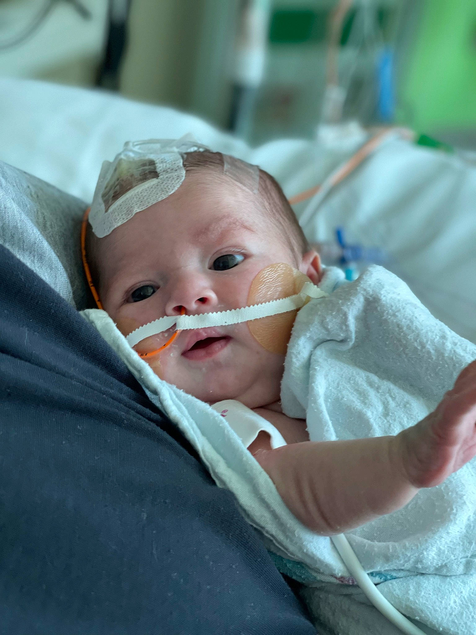 Ayda Jane is registered to the contest to win money with this photo: baby, baby_products, baby_toddler_clothing, cheek, child, comfort, event, eye, eyebrow, eyelash, face, fun, hat, iris, linens, nose, person, room, sitting, skin