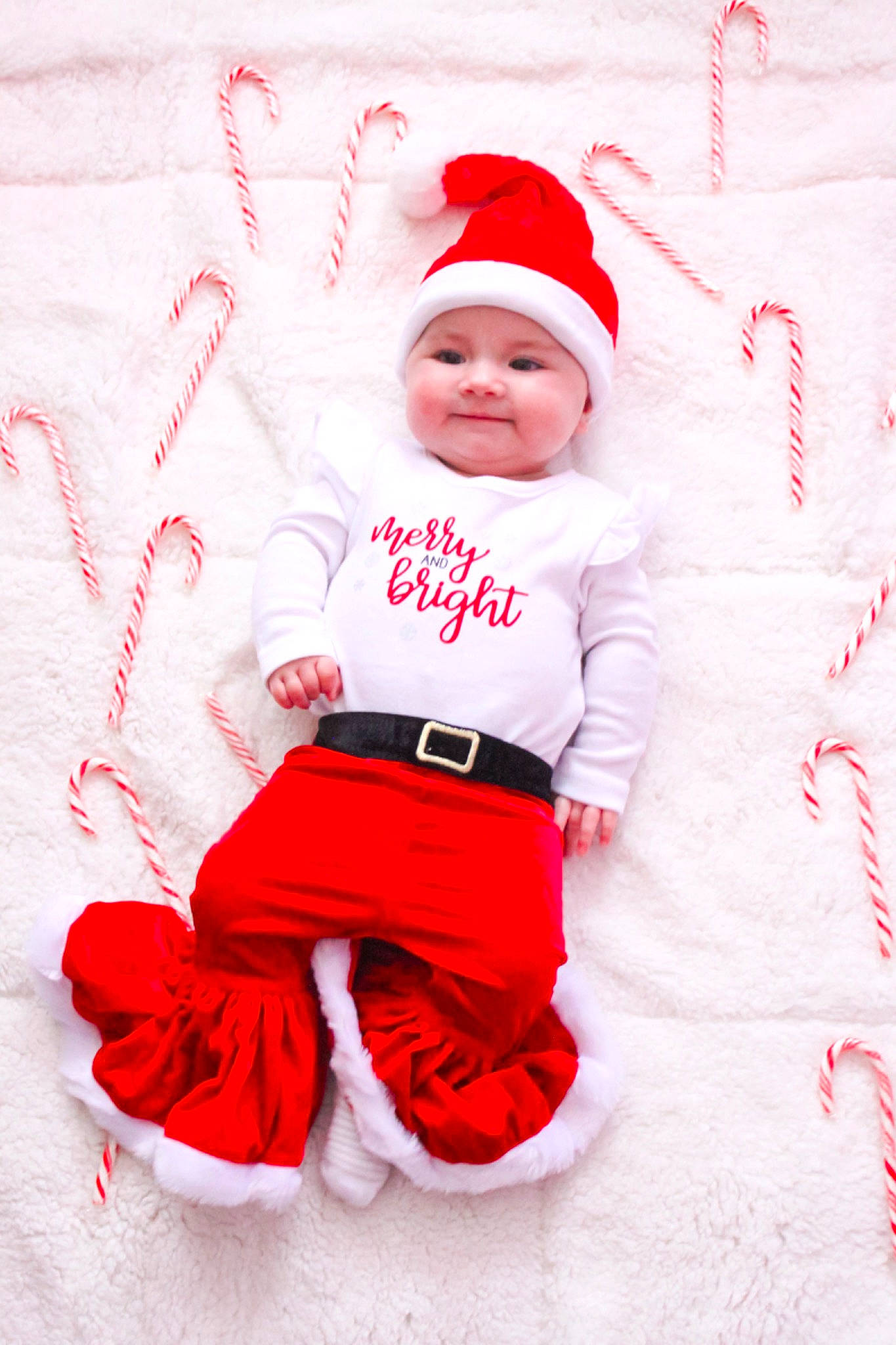 Ayda joined the competition — help win amazing prizes! baby, baby_toddler_clothing, cap, carmine, child, christmas, christmas_eve, costume, costume_hat, event, fictional_character, happy, hat, headwear, holiday, joy, pattern, person, santa_claus, sleeve