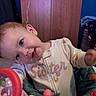 Riley joined the competition — help win amazing prizes! activity_center, baby, child, clothing, cute, expression, face, furniture, happy, head_tilt, indoor, infant, little_sister, onesie, person, play, room, smile, toy, young