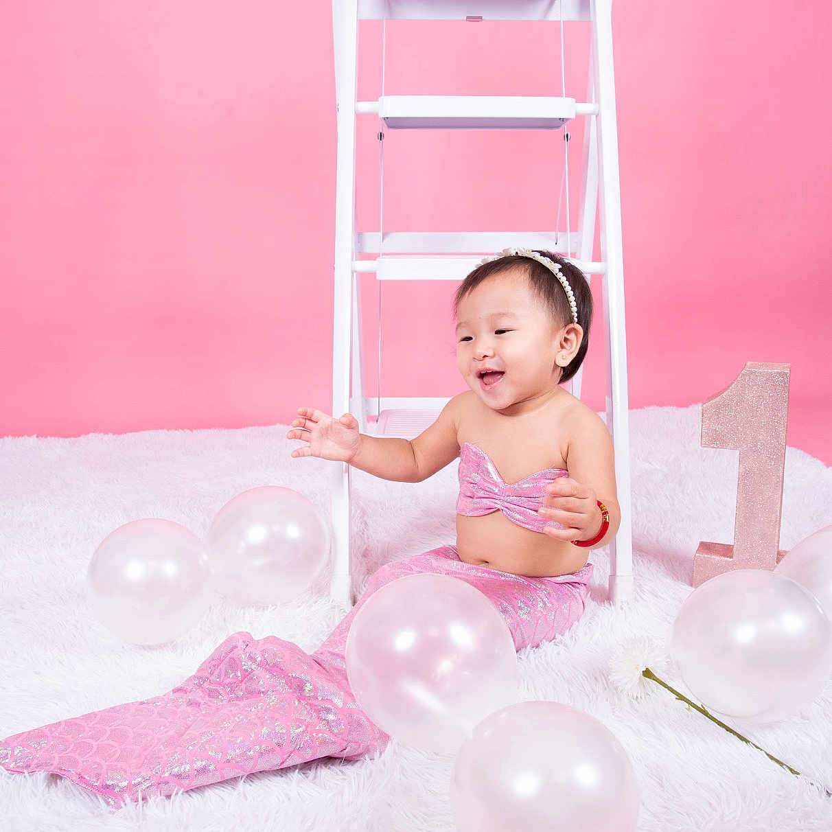 Nolyn Shiloh Trevino joined the competition — help win amazing prizes! baby, balloon, bed, bedroom, clothing, dress, face, furniture, happy, head, homedecor, indoors, people, person, photography, playarea, portrait, sitting, smile, sphere