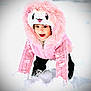 animal_hood, child, cold_weather, crawling, cute, face, frosty, fun, happy, hood, nature, outdoor, pink_jacket, play, smiling, snow, snow_play, winter, winter_clothing, young_child