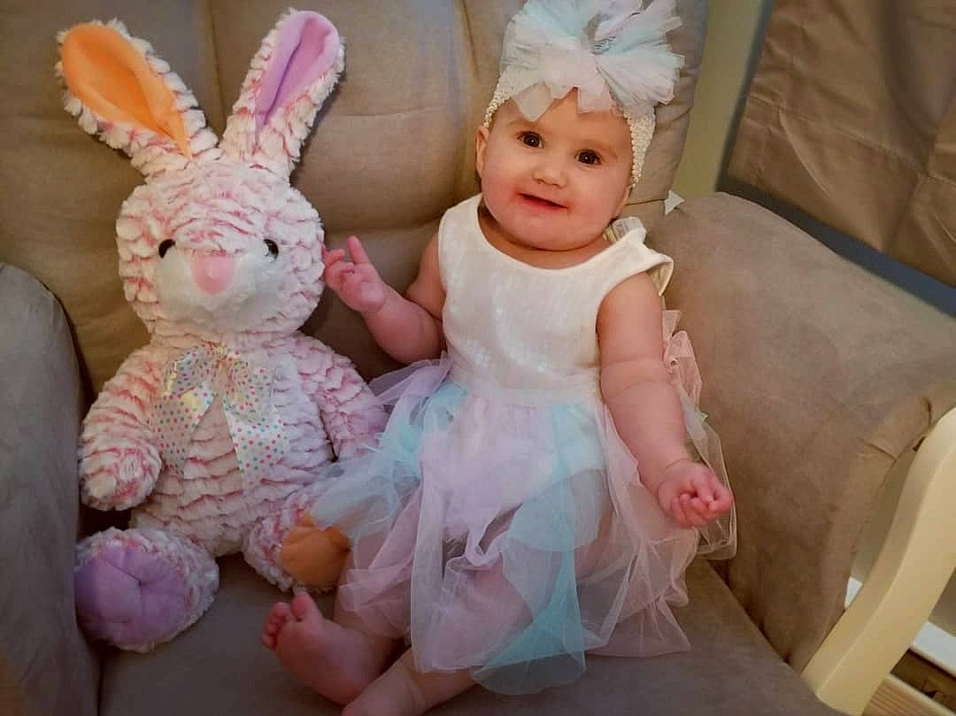 Rosie joined the competition — help win amazing prizes! baby, child, ear, easter, easter_bunny, headwear, joy, person, pink, room, stuffed_toy, toddler, toy