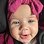 Dahlia is registered to the contest to win money with this photo: baby, child, face, headband, pink, smile, blue_eyes, clothing, sweater, closeup, infant, cute, portrait, happy, chubby_cheeks, indoors, seatbelt, car_seat, headwear, young