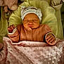 baby, bed, blanket, child, clothing, cozy, cute, hands, hat, indoors, infant, newborn, peaceful, pink, plush_toy, portrait, resting, sleeping, soft_toys, warm