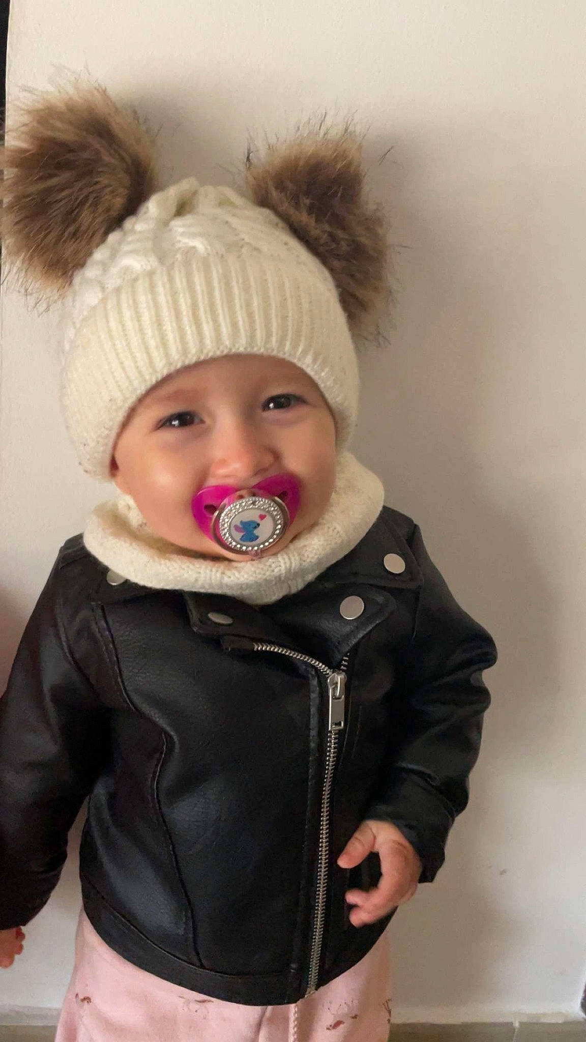 Oriana participe au concours pour gagner de l'argent avec cette photo : baby, cap, cheek, chin, clothing, eye, eyebrow, eyelash, face, head, headgear, headwear, human_body, iris, jacket, lip, neck, nose, outerwear, person