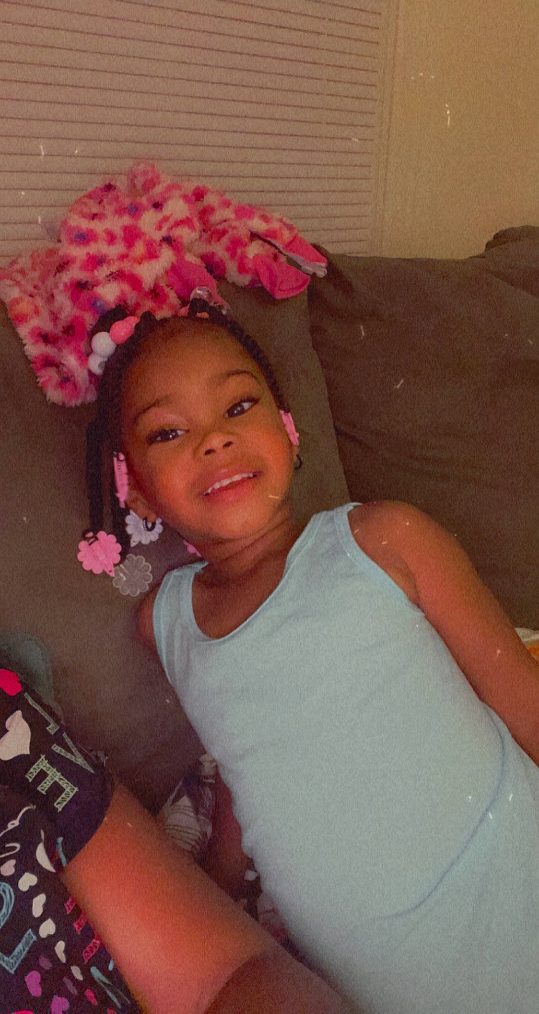 Lylah is registered to the contest to win money with this photo: arm, cheek, chin, eye, eyebrow, face, facial_expression, forehead, hair, happy, headgear, iris, joy, lip, mouth, neck, nose, person, pink, skin