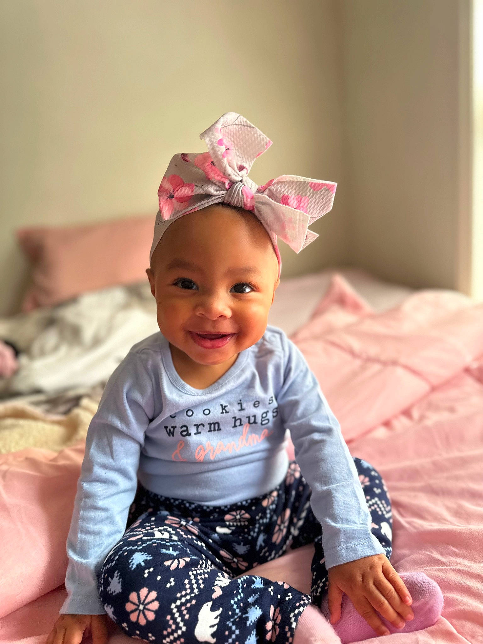 Kensley joined the competition — help win amazing prizes! baby, baby_toddler_clothing, cap, child, costume_hat, eye, fashion_accessory, fun, happy, headgear, joy, laugh, magenta, party_supply, pattern, person, pink, sitting, sleeve, smile