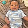 Zenaaliyah joined the competition — help win amazing prizes! baby, infant, child, onesie, bird_print, bed, blanket, pacifier, cute, lying_down, soft, comfort, indoor, smiling, young_child, person, portrait, sleepy, cozy, skin