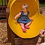 Eleanore joined the competition — help win amazing prizes! toddler, child, slide, playground, yellow_slide, blue_dress, pink_shoes, outdoor, wood_chips, wooden_structure, smiling, curious, person, hand, play, fun, summer, park, daylight, casual_clothing