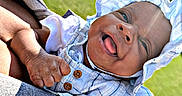 Coreyanna joined the competition — help win amazing prizes! baby, baby_clothes, child, cute, daylight, grass, hand, happy, hat, headwear, holding, infant, nature, outdoor, person, plaid_clothing, portrait, smiling, sunhat, tongue_out