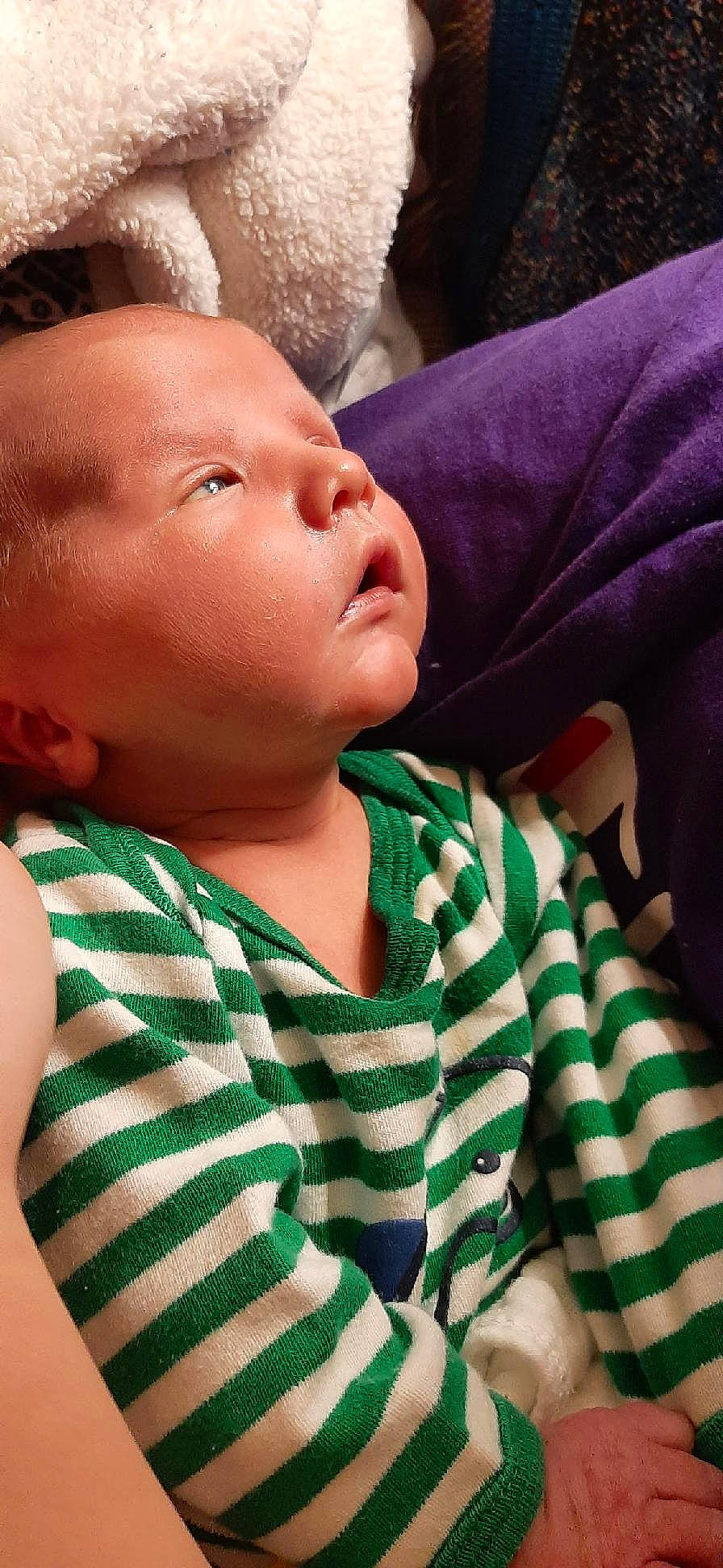 Adam is registered to the contest to win money with this photo: baby, baby_toddler_clothing, cheek, child, chin, comfort, eye, eyebrow, eyelash, facial_expression, finger, happy, human_body, iris, lip, mouth, nose, person, skin, sleeve