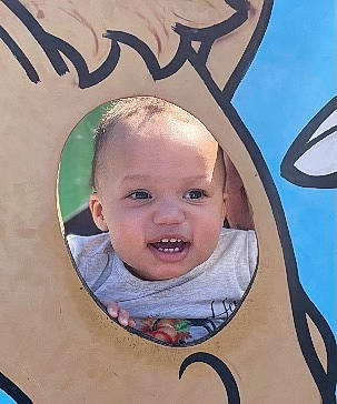 Emery is registered to the contest to win money with this photo: baby, baby_toddler_clothing, cheek, child, chin, eye, eyebrow, eyelash, facial_expression, happy, head, iris, mouth, organ, person, photograph, skin, smile, snapshot, toddler