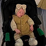 baby, babywearing, beige_clothing, bow, car_seat, child, cute, flooring, footwear, hands, hat, indoor, infant, knit_booties, peaceful, quilted_vest, resting, sleeping, soft_lighting, stroller