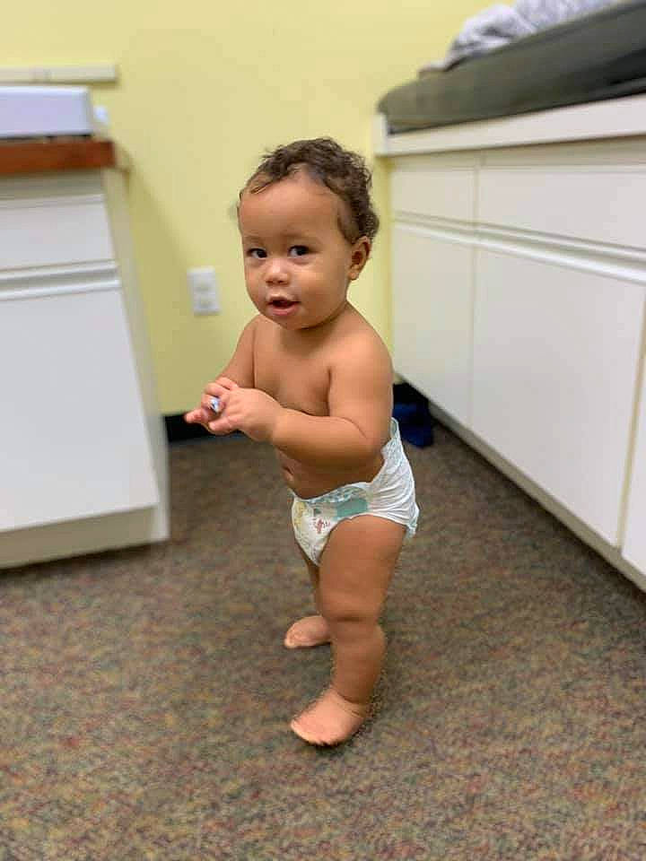 Zakhari is registered to the contest to win money with this photo: abdomen, baby_toddler_clothing, cheek, chest, child, diaper, elbow, finger, floor, flooring, human, human_body, human_leg, joint, person, room, shoulder, standing, stomach, toe