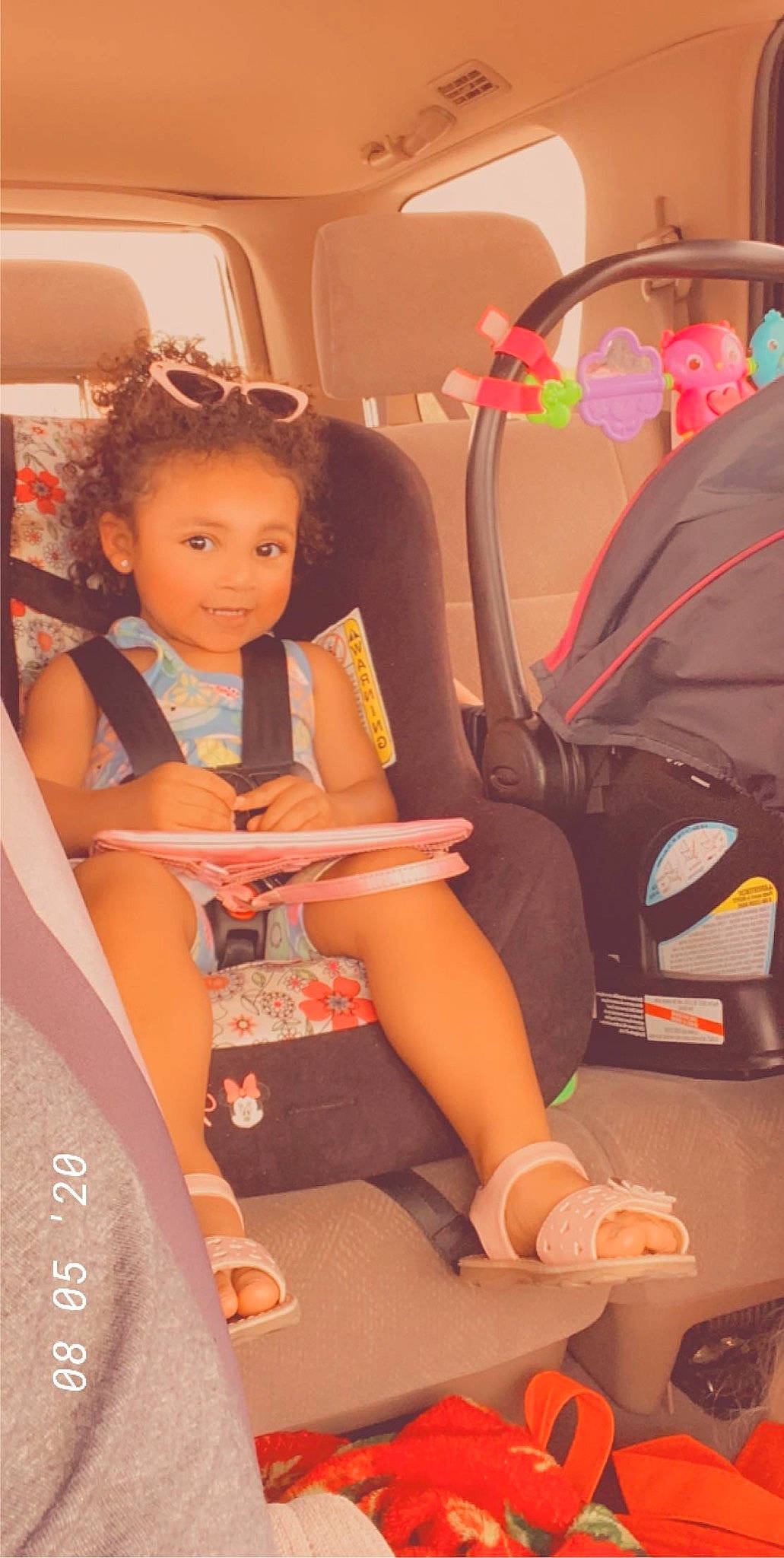 Aria joined the competition — help win amazing prizes! auto_part, car, car_seat, child, family_car, leg, person, seat_belt, sitting, toddler