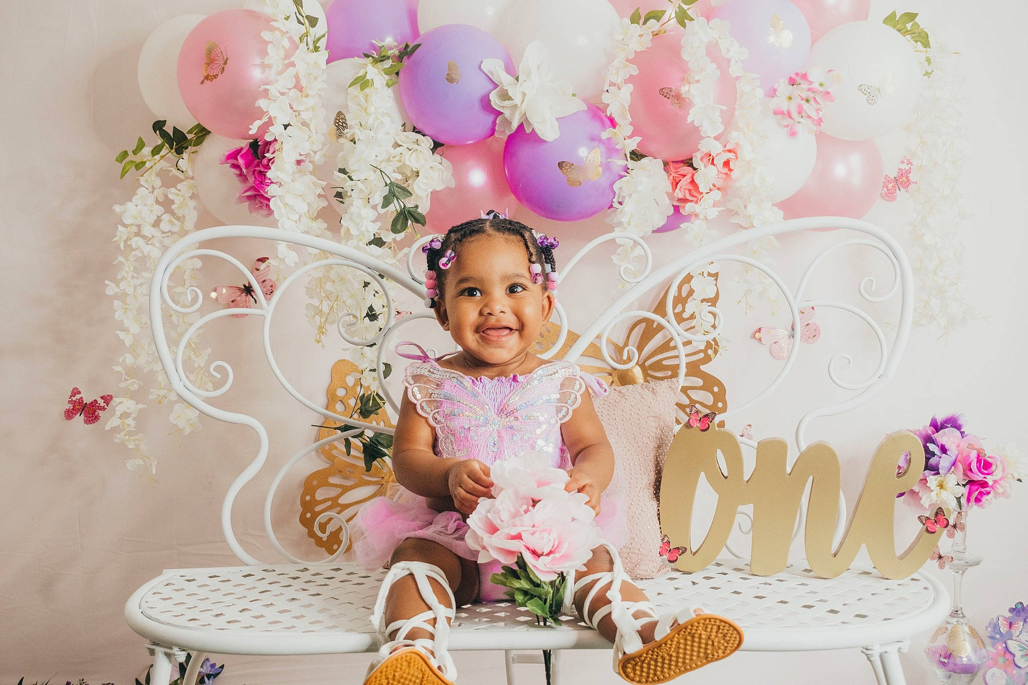 Déhlaní joined the competition — help win amazing prizes! baby, chair, child, decoration, event, floral_design, flower, happy, headpiece, joy, magenta, party_supply, pattern, peach, person, petal, photograph, pink, plant, smile