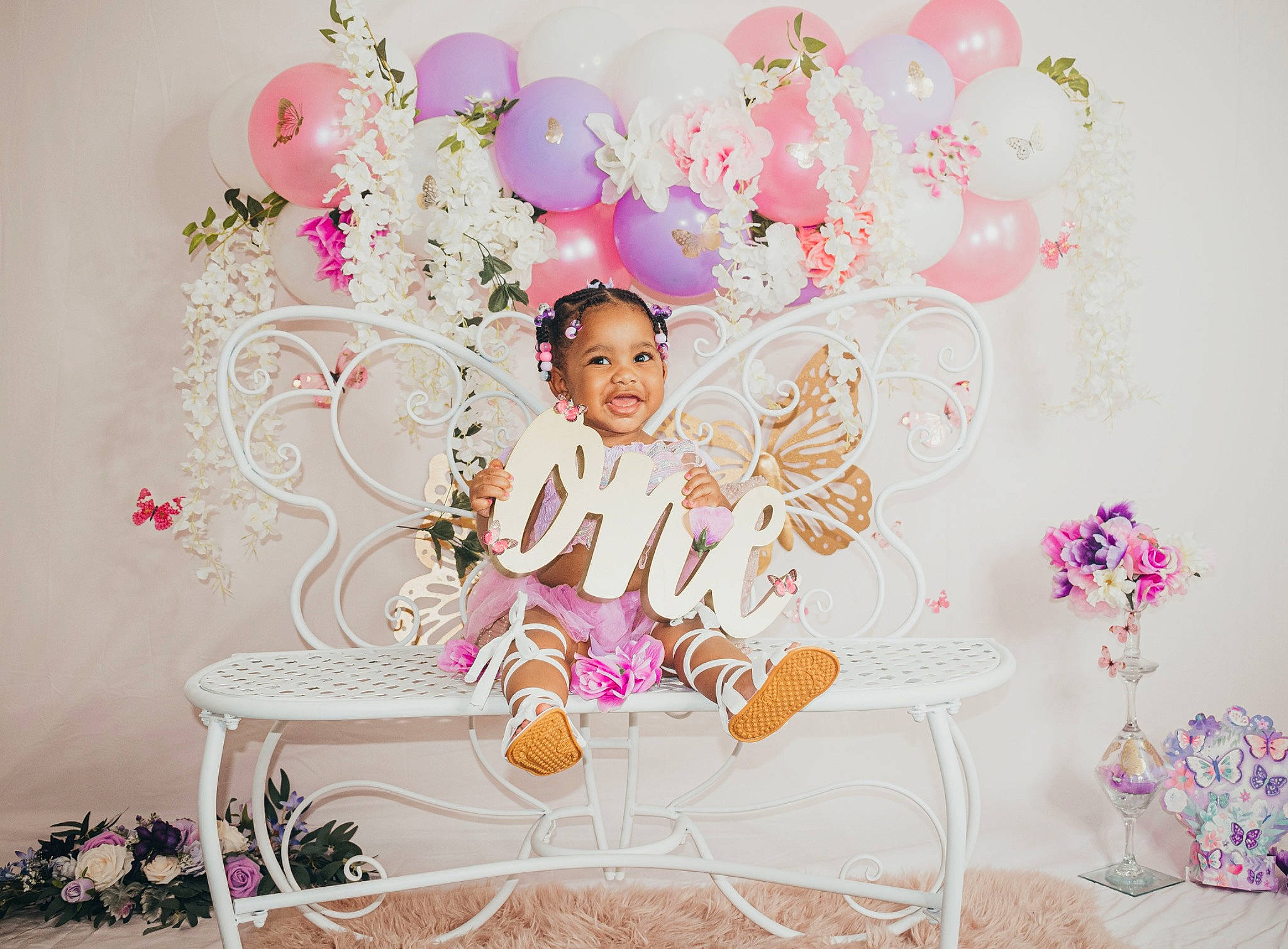 Déhlaní joined the competition — help win amazing prizes! baby, child, decoration, event, fashion_accessory, font, hair_accessory, happy, headpiece, magenta, ornament, party_supply, pattern, peach, person, petal, picture_frame, pink, room, sitting