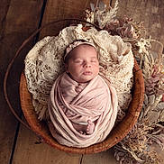 Lou participe au concours pour gagner de l'argent avec cette photo : baby, closeup, cozy, cute, decor, dried_flowers, headband, infant, lace, newborn, peaceful, pink, portrait, sleeping, soft_light, swaddled, vintage_style, wooden_bowl, wooden_floor, wrapped