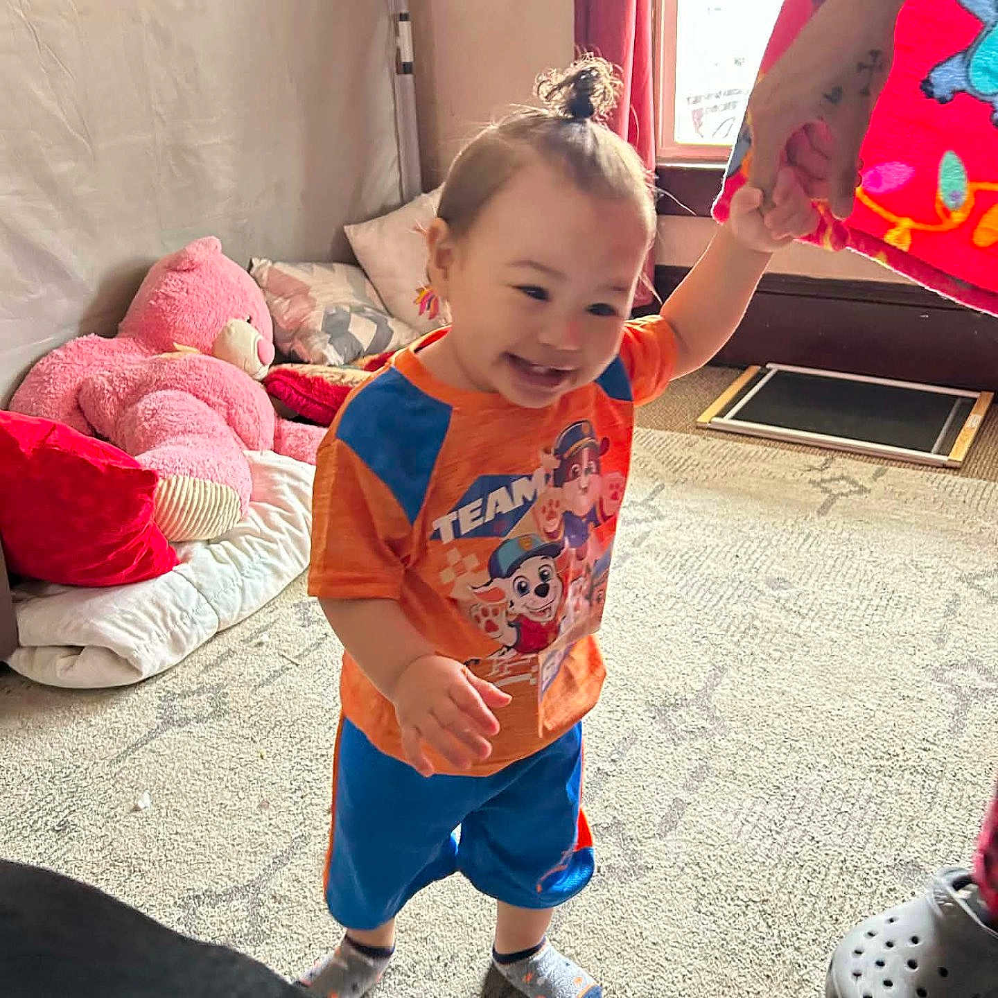 Adonis joined the competition — help win amazing prizes! carpet, cartoon_tshirt, child, colorful_clothing, crocs, curtain, family, hand, happy, holding_hand, indoors, playroom, portrait, smiling, socks, stuffed_animal, teddy_bear, toddler, top_knot, window