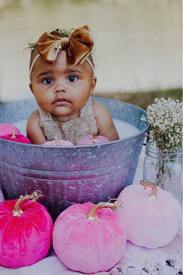 Juliana joined the competition — help win amazing prizes! baby, baby_toddler_clothing, beauty, cheek, child, dress, eye, fun, happy, headwear, iris, natural_foods, peach, person, pink, plant, portrait_photography, room, sitting, sweetness
