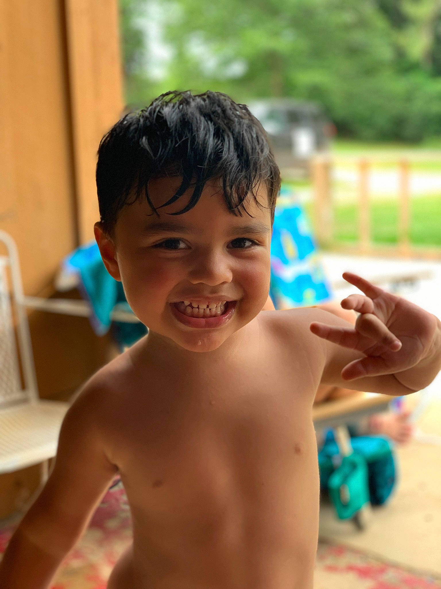 Jose is registered to the contest to win money with this photo: barechested, bathing, chest, child, finger, fun, gesture, hand, happy, joint, joy, leisure, muscle, neck, person, shoulder, skin, smile, thumb, toddler