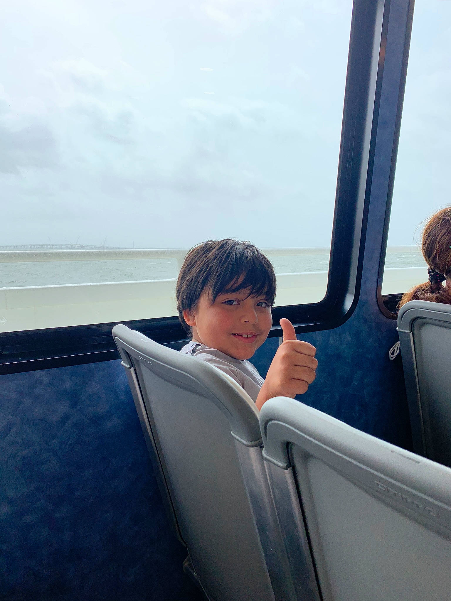 Felipe is registered to the contest to win money with this photo: air_travel, auto_part, automotive_design, automotive_exterior, automotive_window_part, boats_and_boating_equipment_and_supplies, cloud, electric_blue, fun, joy, leisure, motor_vehicle, naval_architecture, passenger, person, recreation, sky, travel, vehicle, vehicle_door