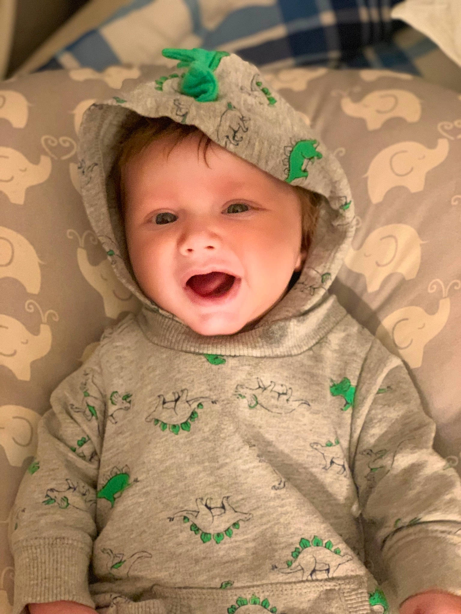 Greyson joined the competition — help win amazing prizes! baby, baby_toddler_clothing, cheek, child, comfort, eye, face, facial_expression, grass, green, happy, head, headwear, helmet, human_body, iris, lip, person, skin, sleeve
