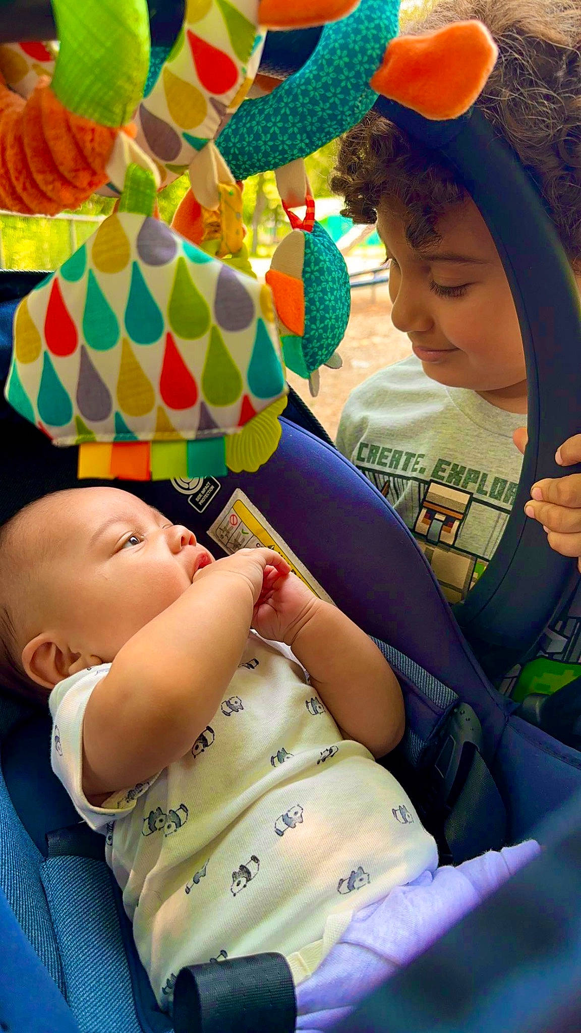 Semaj is registered to the contest to win money with this photo: baby, baby_playing_with_toys, baby_products, baby_toddler_clothing, child, comfort, fun, green, happy, leisure, pattern, person, play, product, sharing, sitting, skin, textile, toddler, toy