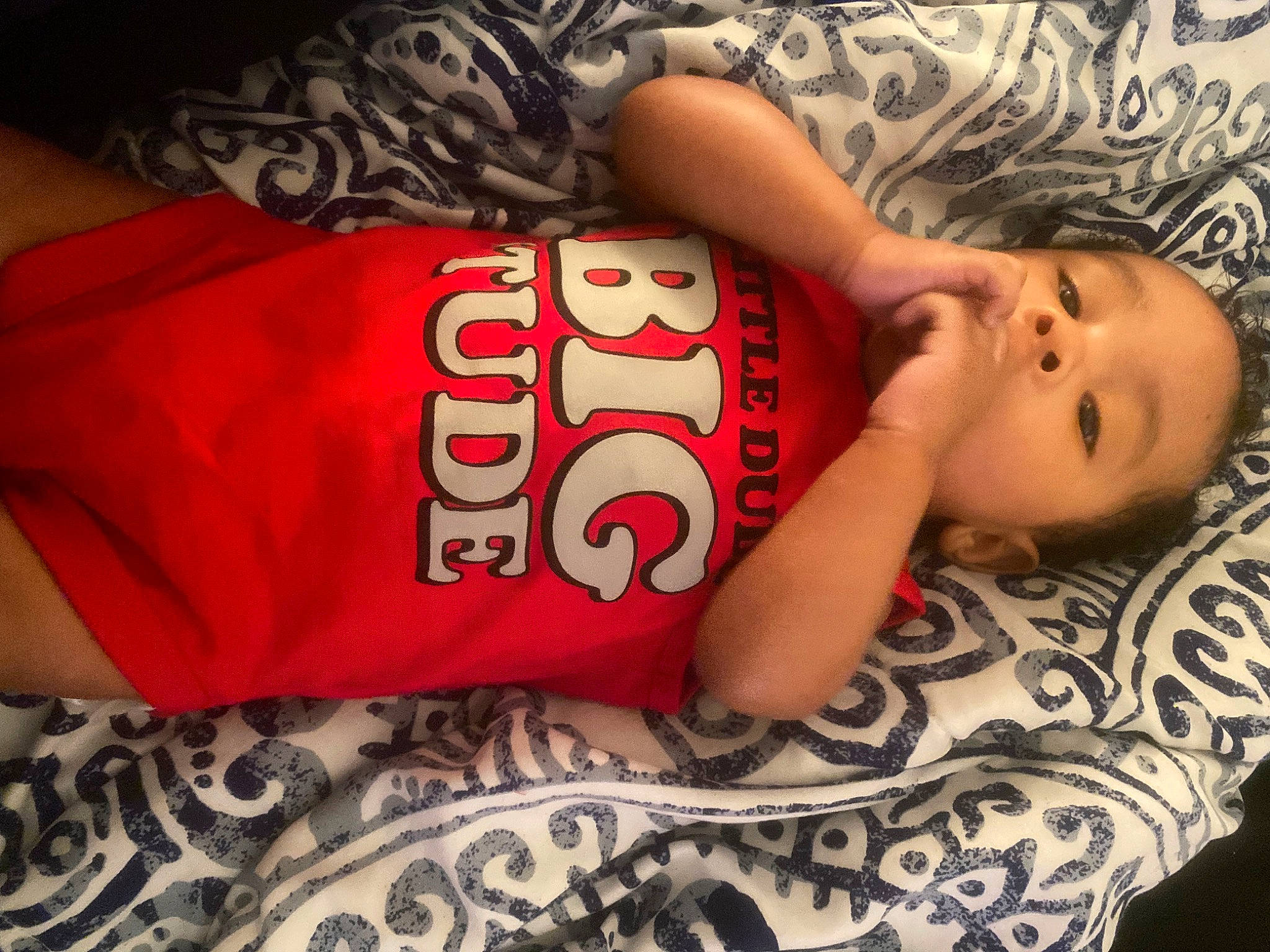 Cartier is registered to the contest to win money with this photo: baby_toddler_clothing, chest, chin, comfort, elbow, eye, flooring, head, joint, linens, mouth, neck, pattern, person, skin, sleeve, thigh, toddler, trunk, wood