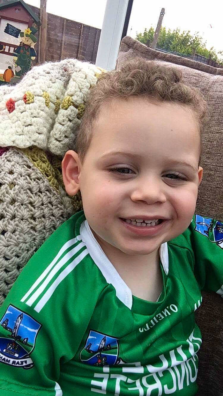 Dylan is registered to the contest to win money with this photo: boy, cheek, child, cool, day, eye, face, facial_expression, forehead, fun, grass, green, hairstyle, head, iris, joy, product, skin, smile, toddler