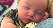 Atticus joined the competition — help win amazing prizes! baby, camo_clothing, child, closeup, cute, face, hair, hand, indoor, infant, mitten, newborn, peaceful, person, portrait, rest, skin, sleeping, soft, toddler