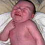Ridge is registered to the contest to win money with this photo: baby, newborn, smile, blanket, skin, infant, sleepy, cute, child, face, arm, hand, relax, comfort, soft, lying_down, indoors, cozy, peaceful, portrait