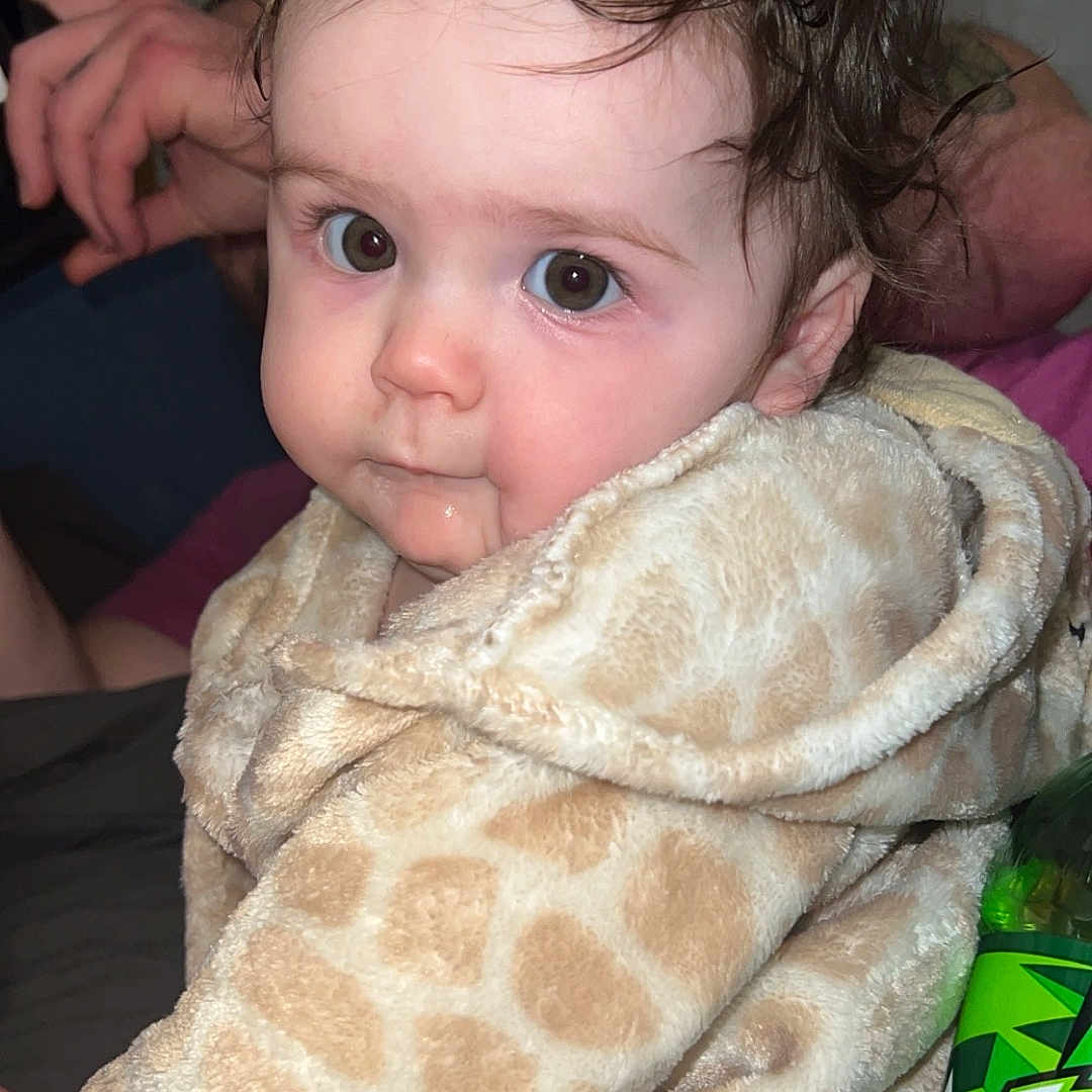 Nikenly joined the competition — help win amazing prizes! baby, blanket, bodypart, can, clothing, coat, couch, face, finger, hand, head, hoodie, knitwear, person, photography, portrait, sweater, sweatshirt, tin, towel