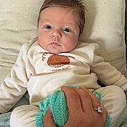 Marceau a rejoint le concours — aidez-le/la à gagner de superbes lots ! baby, blanket, blue_eyes, clothing, comfort, cushion, cute, face, hand, indoor, infant, knitted_sock, newborn, pajamas, person, portrait, resting, ring, soft, texture