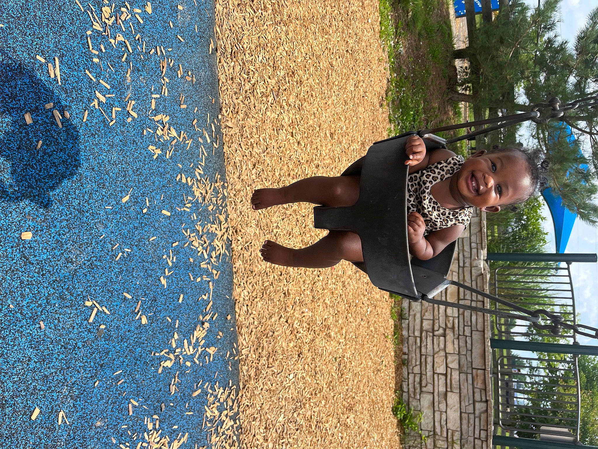 Afia is registered to the contest to win money with this photo: asphalt, child, city, electric_blue, fun, grass, happy, human_leg, joy, landscape, leisure, people_in_nature, person, plant, recreation, road_surface, shadow, sidewalk, soil, tar