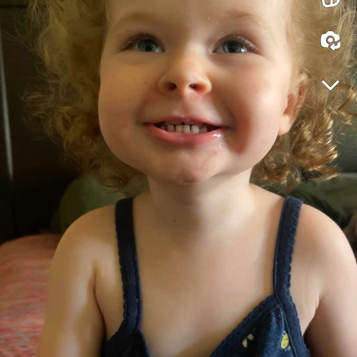 Violet is registered to the contest to win money with this photo: accessories, baby, blonde, bodypart, clothing, dress, face, hair, happy, head, indoors, jewelry, laughing, mouth, necklace, person, photography, portrait, smile, teeth
