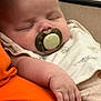 Andrew is registered to the contest to win money with this photo: baby, sleeping, pacifier, closeup, hand, blanket, infant, resting, peaceful, soft, cute, child, nap, indoors, comfort, skin, face, clothing, cozy, relaxation