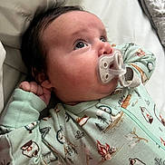 Kashton joined the competition — help win amazing prizes! baby, pacifier, onesie, infant, sleepwear, bed, bedding, child, cute, face, hand, sleep, comfort, soft, pattern, warm, lying_down, portrait, indoor, cozy