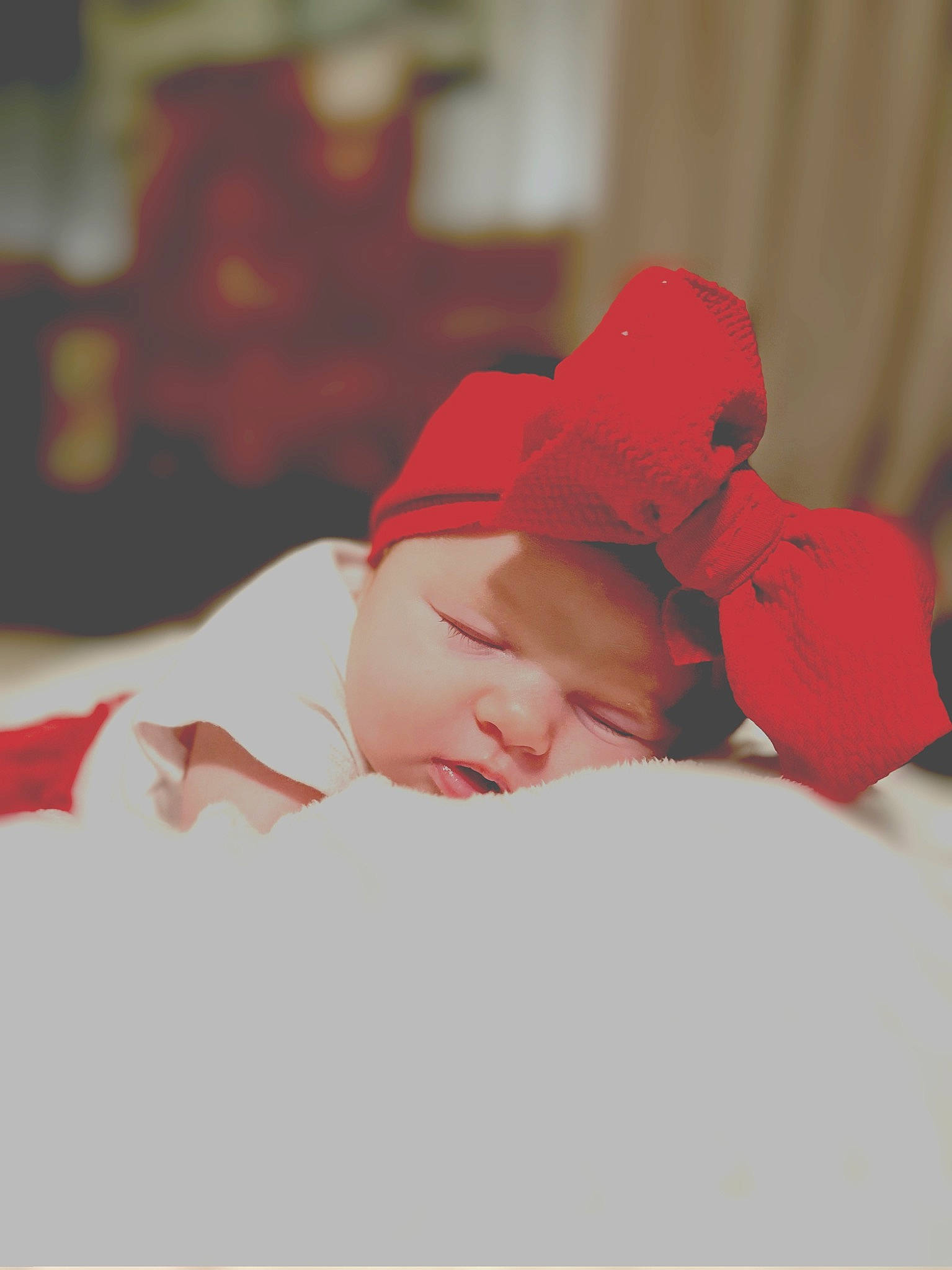 Gabriella is registered to the contest to win money with this photo: baby, baby_sleeping, baby_toddler_clothing, bedtime, cap, carmine, child, comfort, eye, happy, hat, headgear, headwear, linens, lip, mouth, peach, person, petal, skin