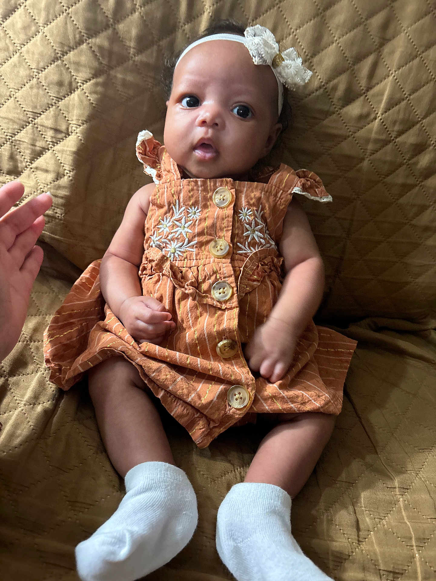 Samaria joined the competition — help win amazing prizes! baby, bodypart, clothing, couch, cushion, dress, face, finger, furniture, hand, hat, head, hosiery, machine, person, photography, portrait, screw, sitting, sock