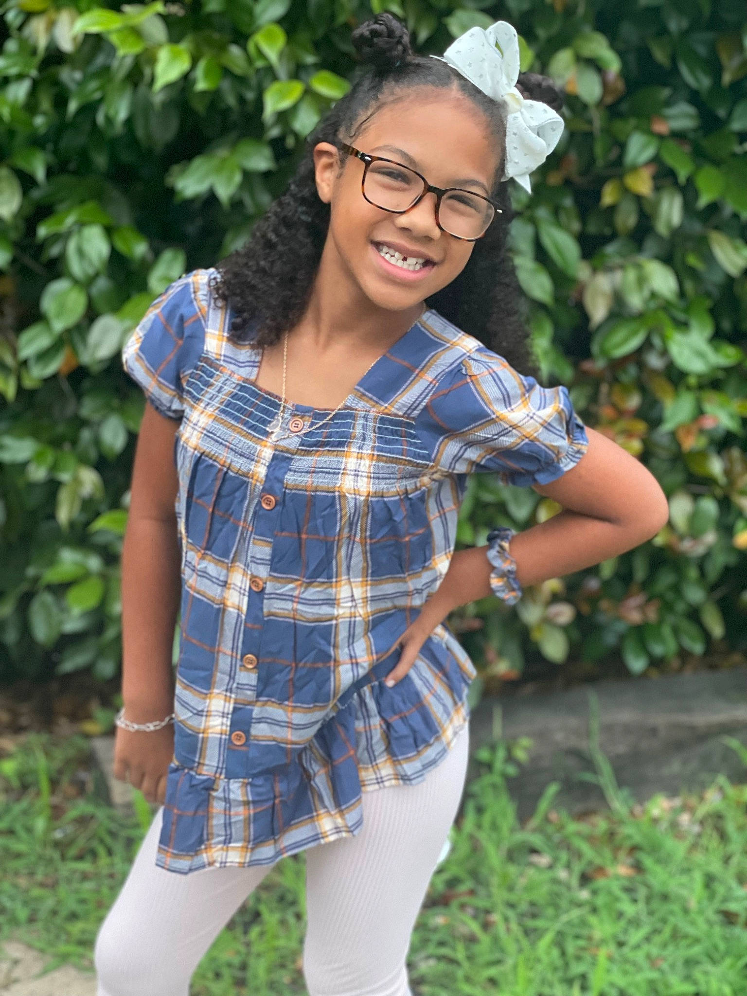Payton joined the competition — help win amazing prizes! black_hair, cool, electric_blue, eyewear, fun, glasses, grass, hairstyle, happy, joy, long_hair, pattern, people_in_nature, person, plaid, plant, shoulder, sleeve, smile, tartan