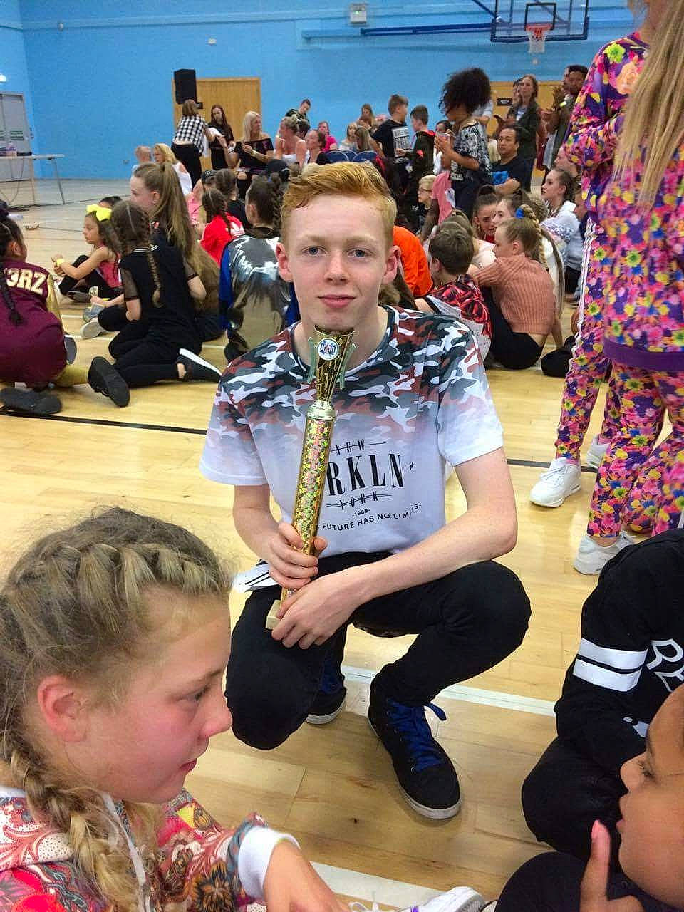 Ethan joined the competition — help win amazing prizes! child, crowd, event, performance, person