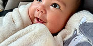 Danica joined the competition — help win amazing prizes! adorable, animal_embroidery, baby, blanket, car_seat, child, closeup, comfort, cozy, cute, eyelashes, face, happy, indoors, infant, smile, soft_texture, toddler, warm, wrapped