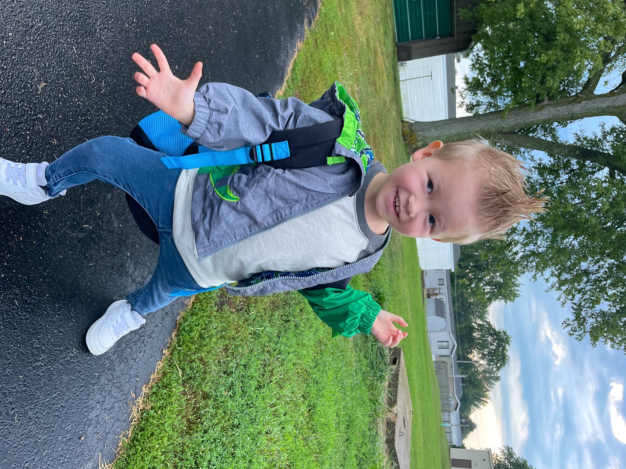 Kaiden is registered to the contest to win money with this photo: child, cloud, cool, denim, electric_blue, fun, grass, green, happy, joy, lawn, leisure, people_in_nature, person, plant, recreation, sky, smile, sneakers, toddler