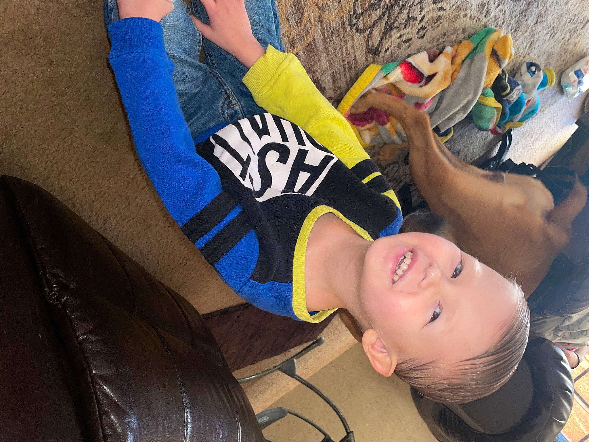 Kaiden is registered to the contest to win money with this photo: arm, automotive_design, automotive_tire, cool, elbow, finger, fun, hand, happy, headgear, human_leg, joy, leg, leisure, person, personal_protective_equipment, smile, sportswear, t_shirt, thigh