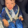 blue, boy, car, car_seat, child, clothing, cute, face, hair, hand, indoor, jacket, pacifier, pants, patterned, safety, seat, seatbelt, sitting, toddler