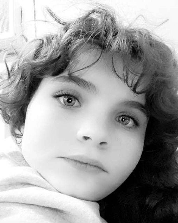 Caylee joined the competition — help win amazing prizes! black, cheek, chin, eyebrow, eyelash, face, flash_photography, forehead, gesture, happy, human_body, iris, jaw, lip, mouth, neck, nose, person, shoulder, skin