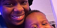 Hymir is registered to the contest to win money with this photo: accessories, baby, bodypart, clothing, earring, face, happy, hat, head, jewelry, mouth, necklace, people, person, photography, portrait, purple, selfie, smile, teeth