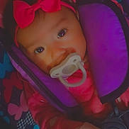 Aleia joined the competition — help win amazing prizes! baby, pacifier, headband, pink_bow, car_seat, child, infant, colorful, heart_emoji, cute, face, clothing, seatbelt, closeup, portrait, soft_light, indoors, expression, adorable, baby_girl